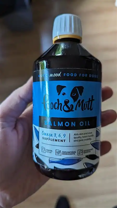 A bottle of Salmon Oil for dogs.